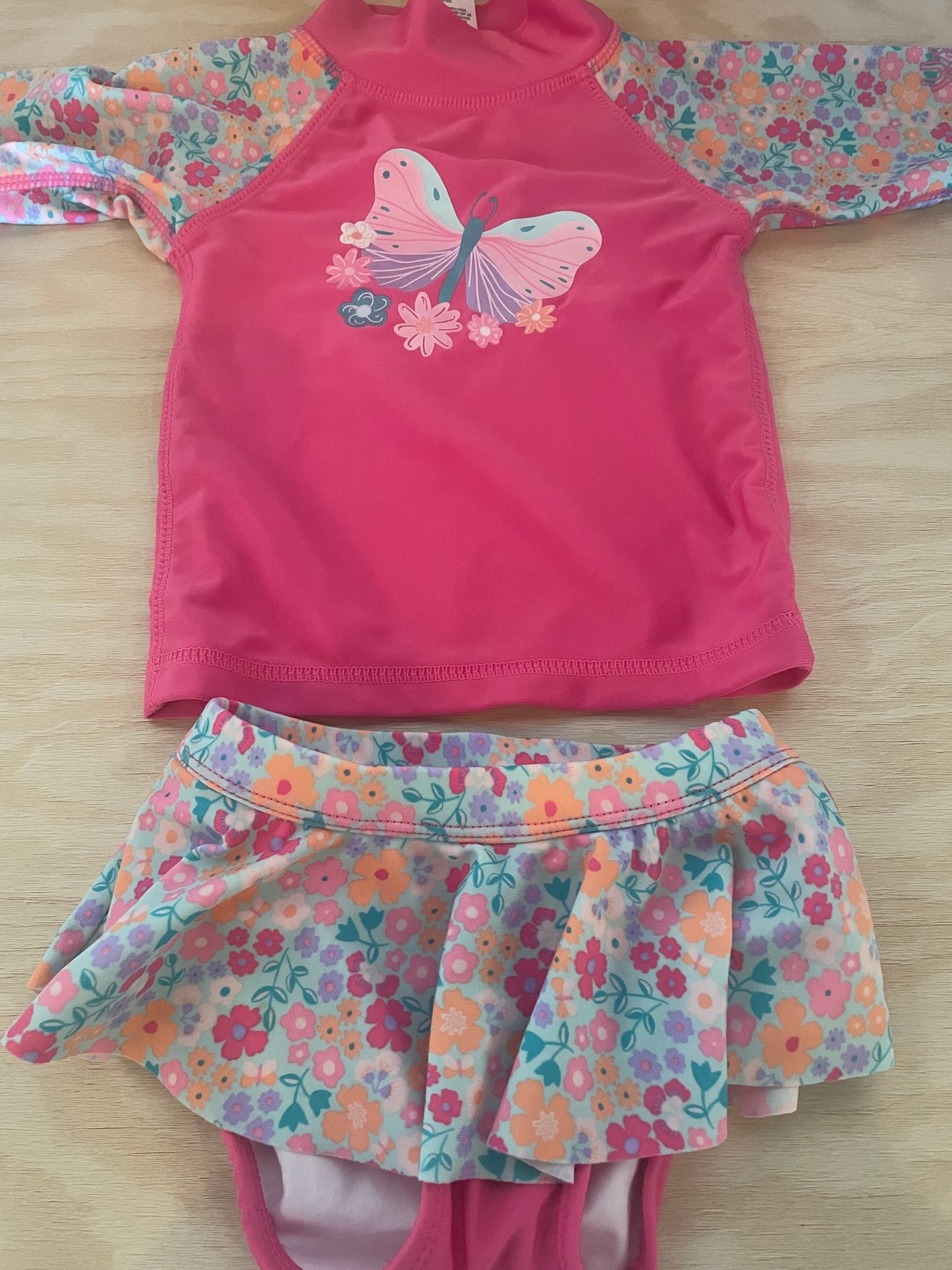 CC-Consignment-Uv skins butterfly swimsuit 12-18M